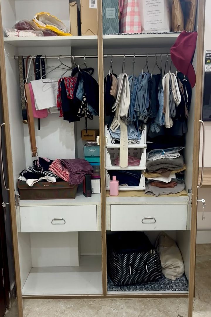 Before: a wardrobe with crowded shelves, mixed hanging clothes and items stacked on the floor